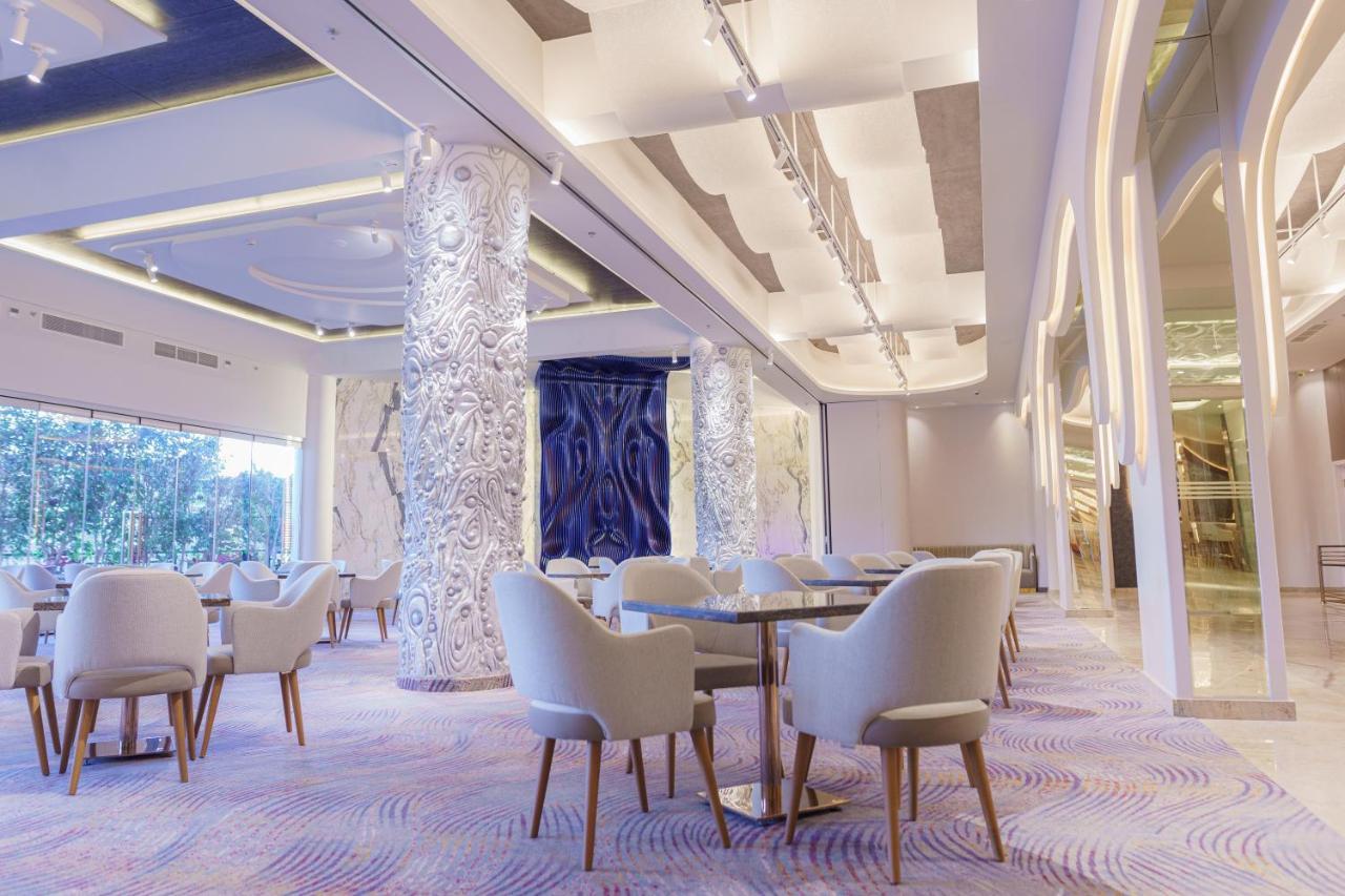 Mirage Hotel & Conference Center Alexandria Exterior foto The interior of the hotel